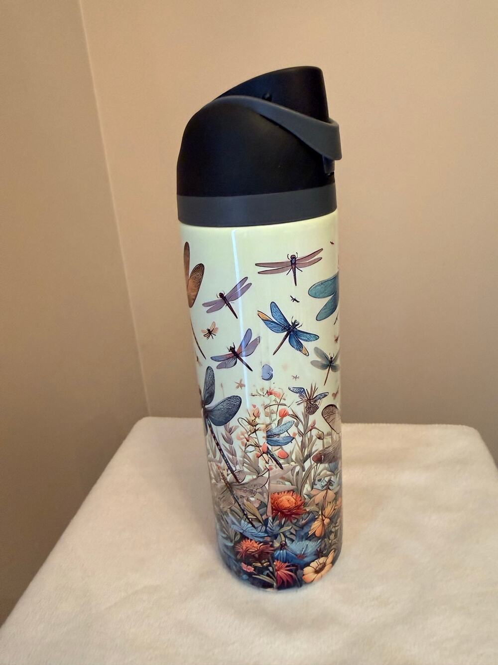 Stainless steel water bottle  design showcasing various dragonflies, wildflowers